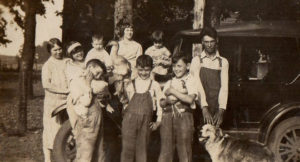9 year old Berry and Bill (center) hold ducks on their cousins farm in Tennessee. Elva, their mother is far left. Photo courtesy of Cynthia Williams
